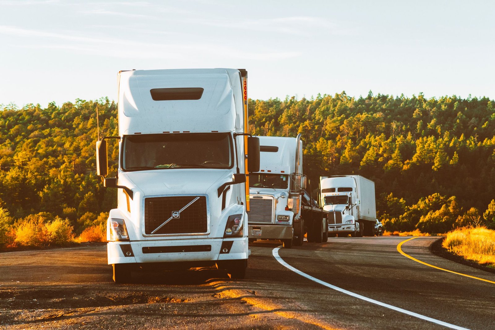 Enclosed freight trailers travelling on a road